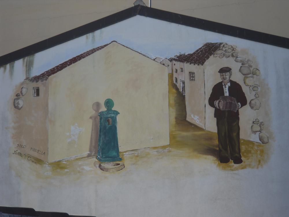 Murale sardo suonatore organetto